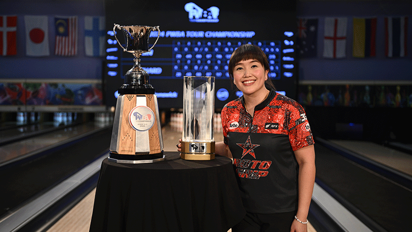 Sin Li Jane with POY and Tour Championship trophies